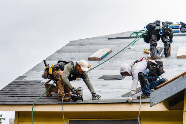 Professional Gutter Installation technician working in Byron, CA